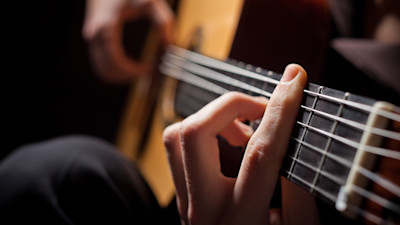 Man playing acoustic guitar