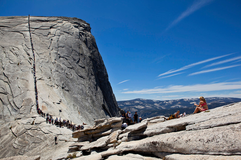 Jimmy Chin's photograph of the cables at half dome in natural light