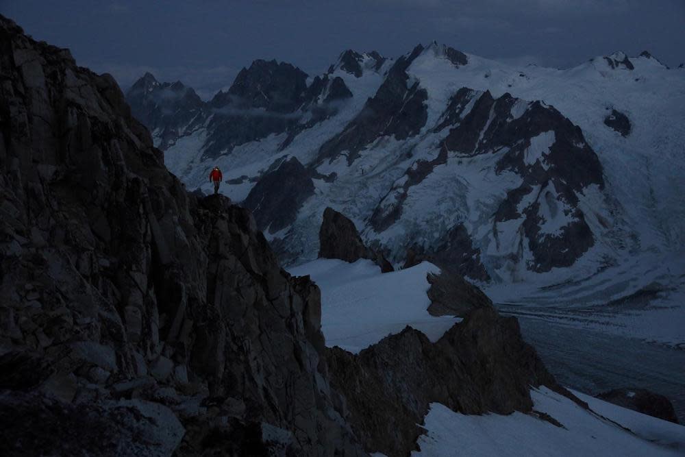 Jimmy Chin's photograph of a cloudy mountain range as an example of negative space