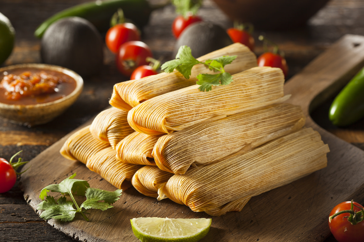 Stack of tamales with ingredients