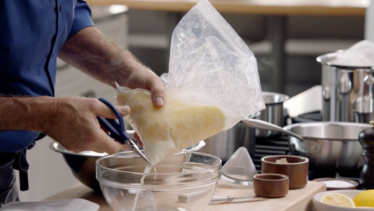 Thomas Keller cutting plastic bag with butter