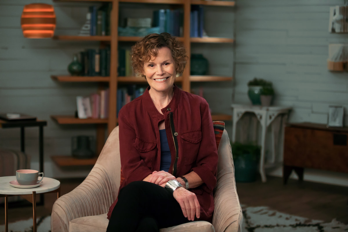 Judy Blume sitting on chair