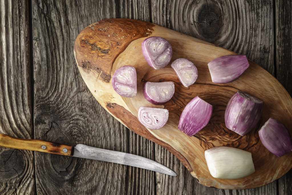 Chopped Shallots on a cutting board