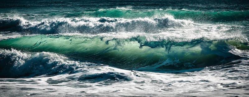 an image of an ocean wave as an example of frozen motion