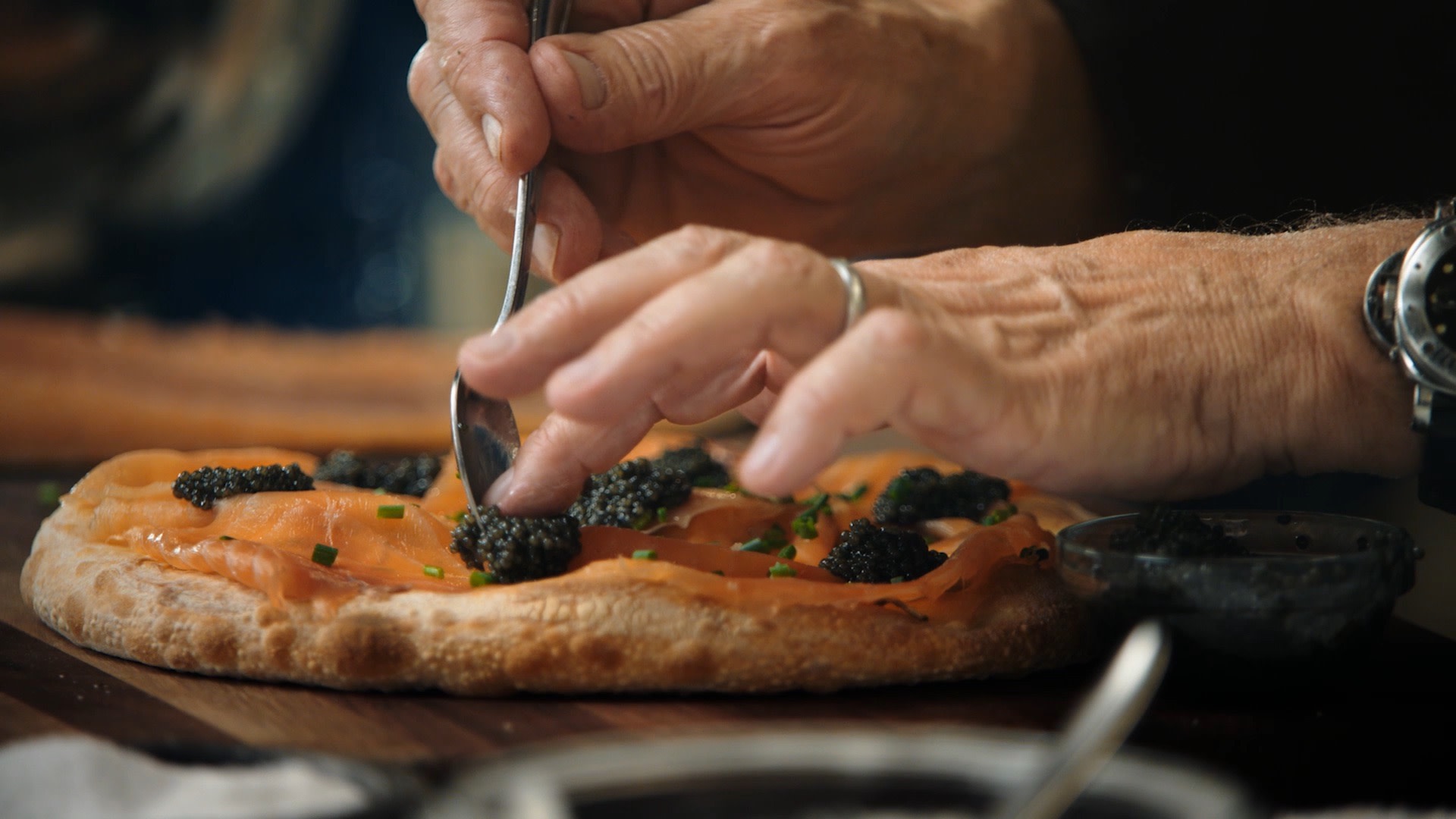 wolfgang pucks smoked salmon pizza plating