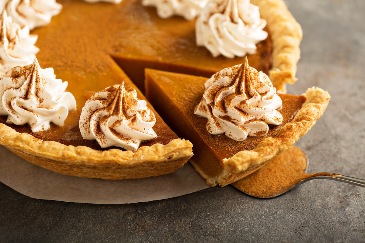 Pumpkin pie with cream and cinnamon