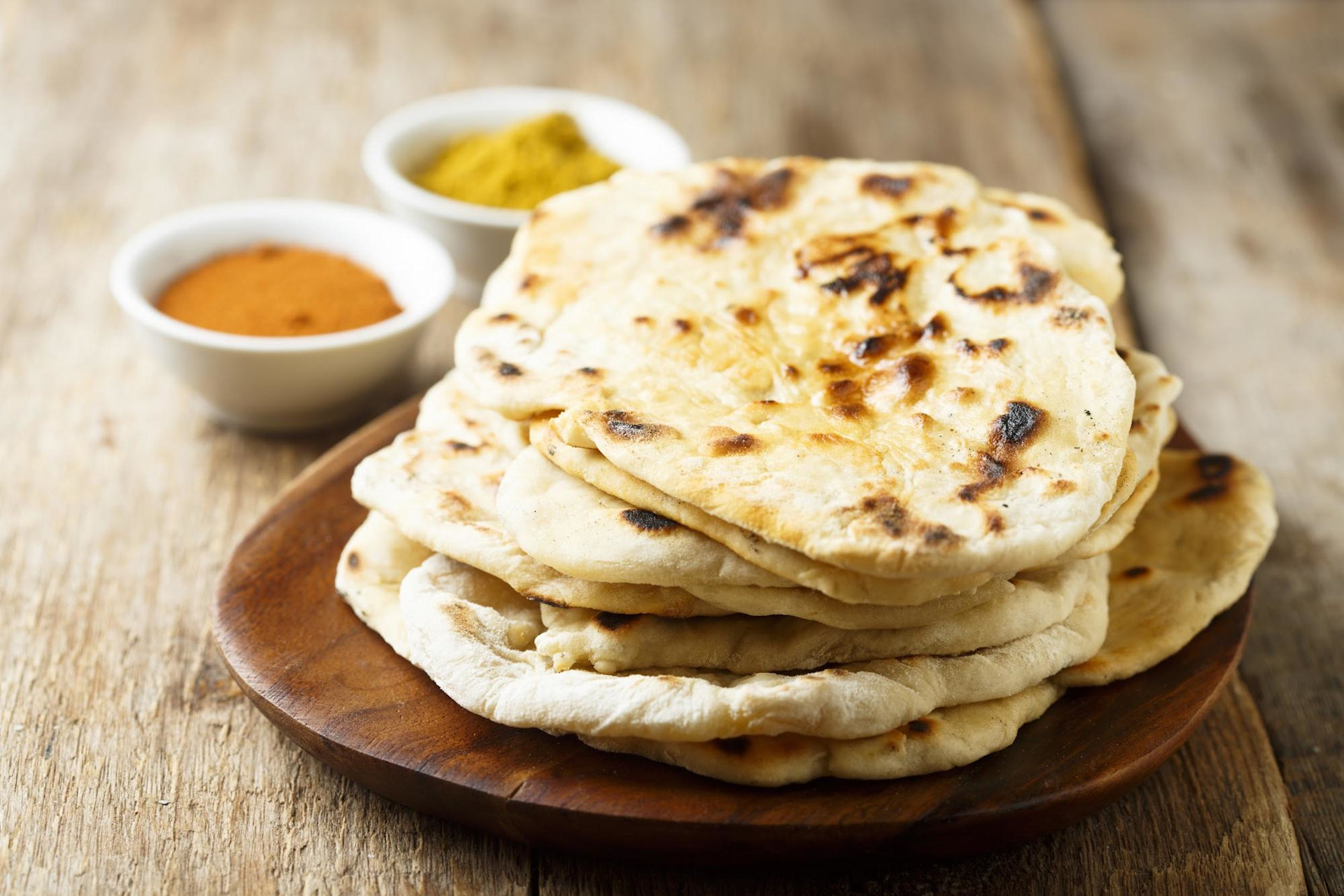 A stack of buttery naan