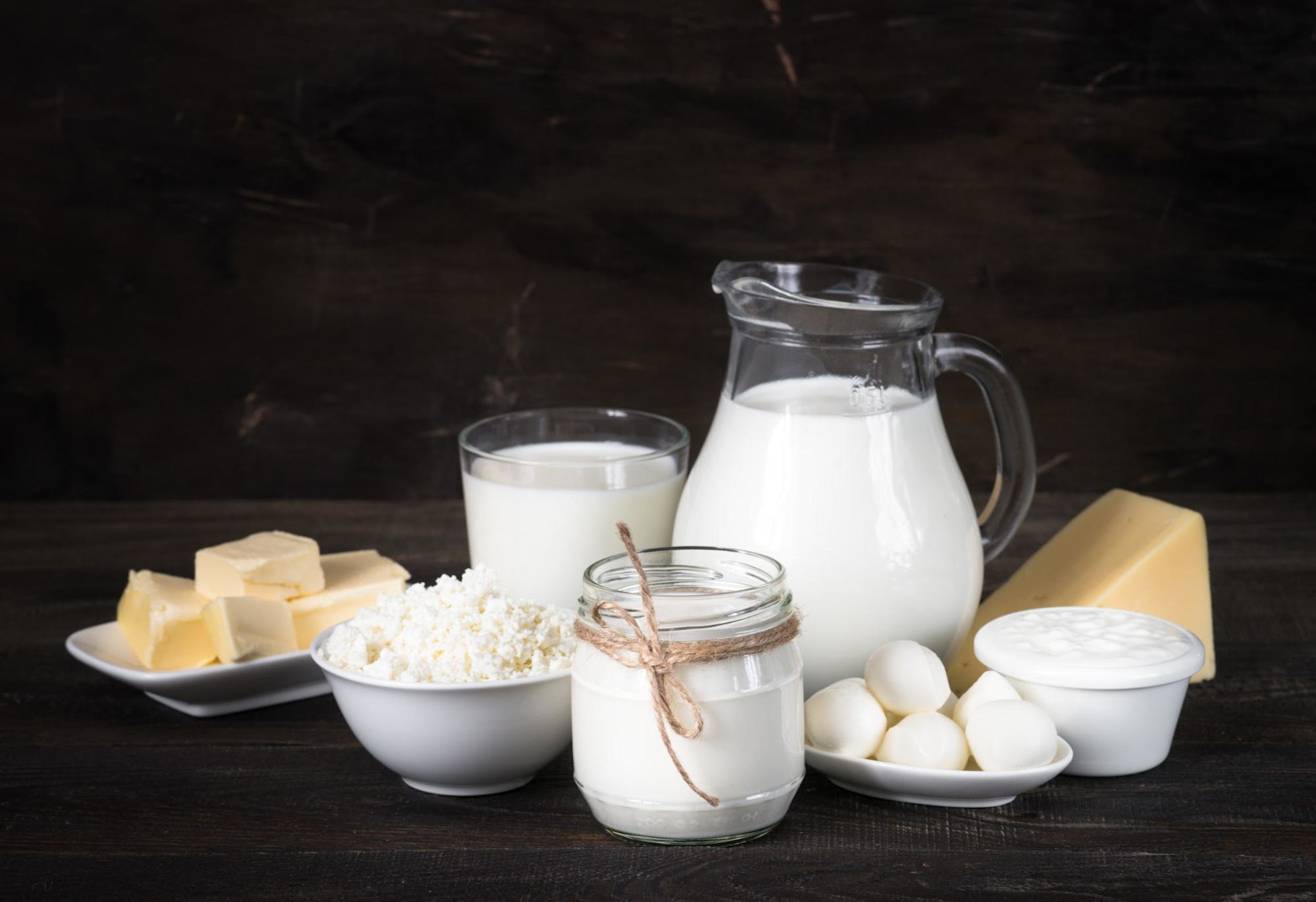 eggs and dairy ingredients on black background