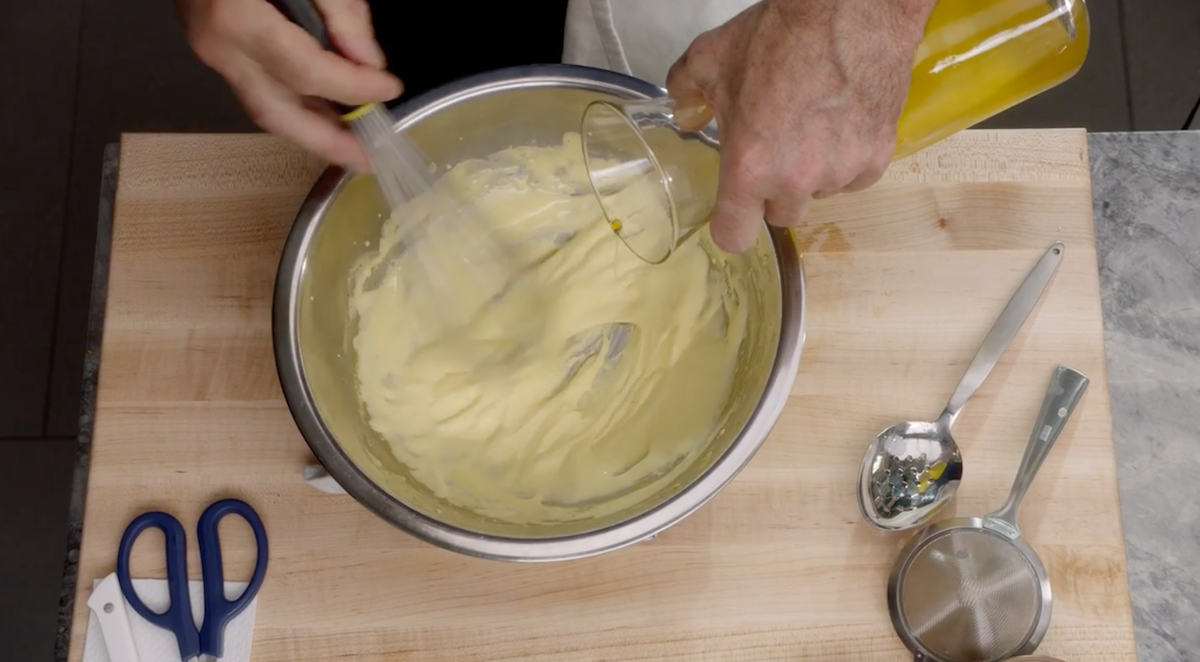 Thomas Keller adding clarified butter to sauce