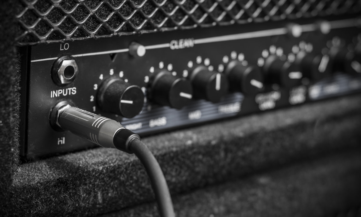 A guitar amp plugged in