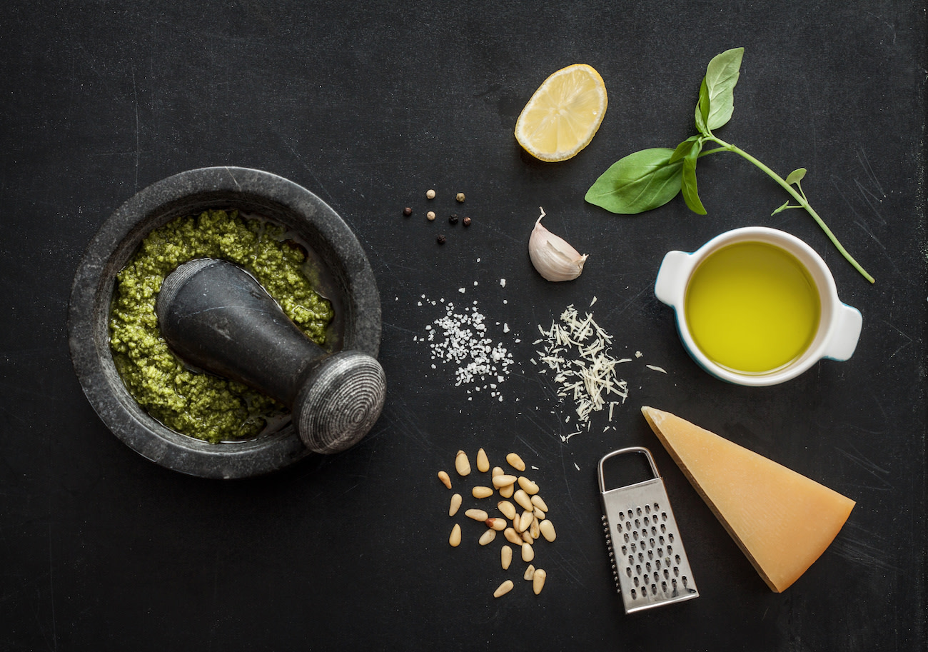 The ingredients needed for basil pesto. shot from above.