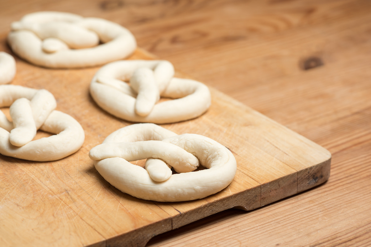 Pretzel dough on wood board