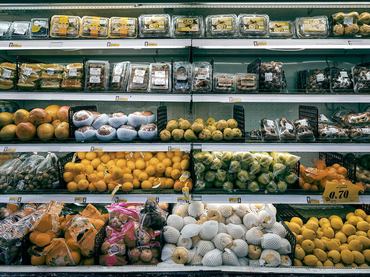 an image of grocery store section as a benefit of the results of the invisible hand