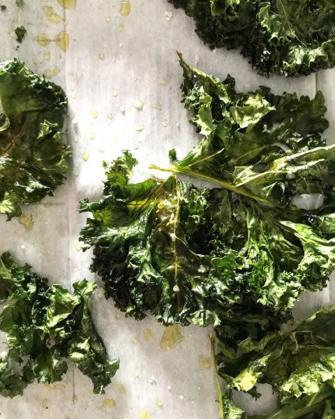 Baked kale leaves with olive oil and salt