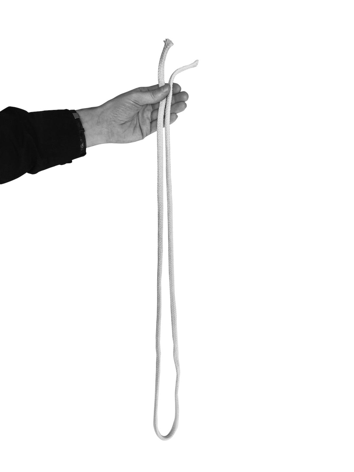 Person holding rope that is folded