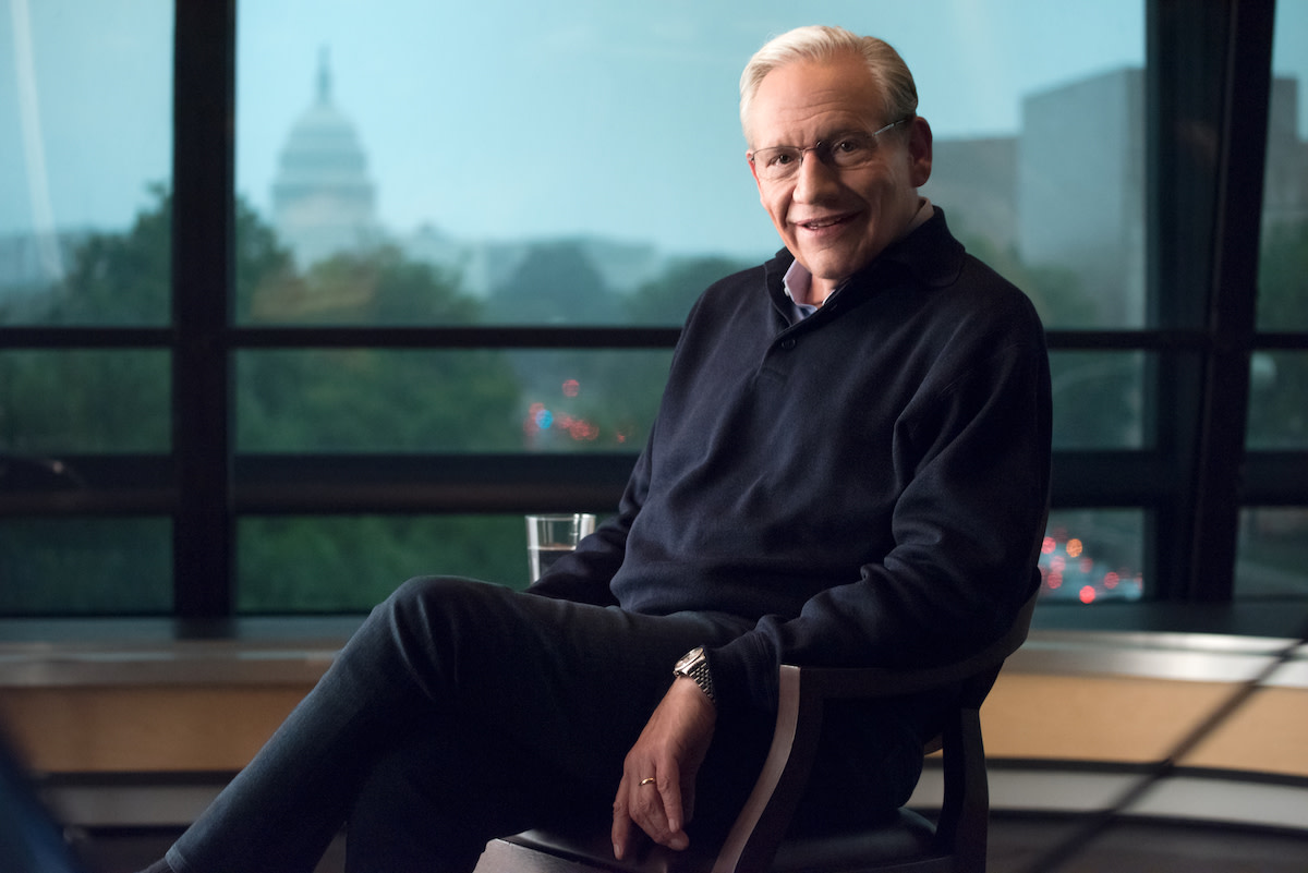 Bob Woodward sitting in chair in front of DC