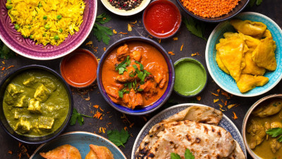 A table full of various indian dishes
