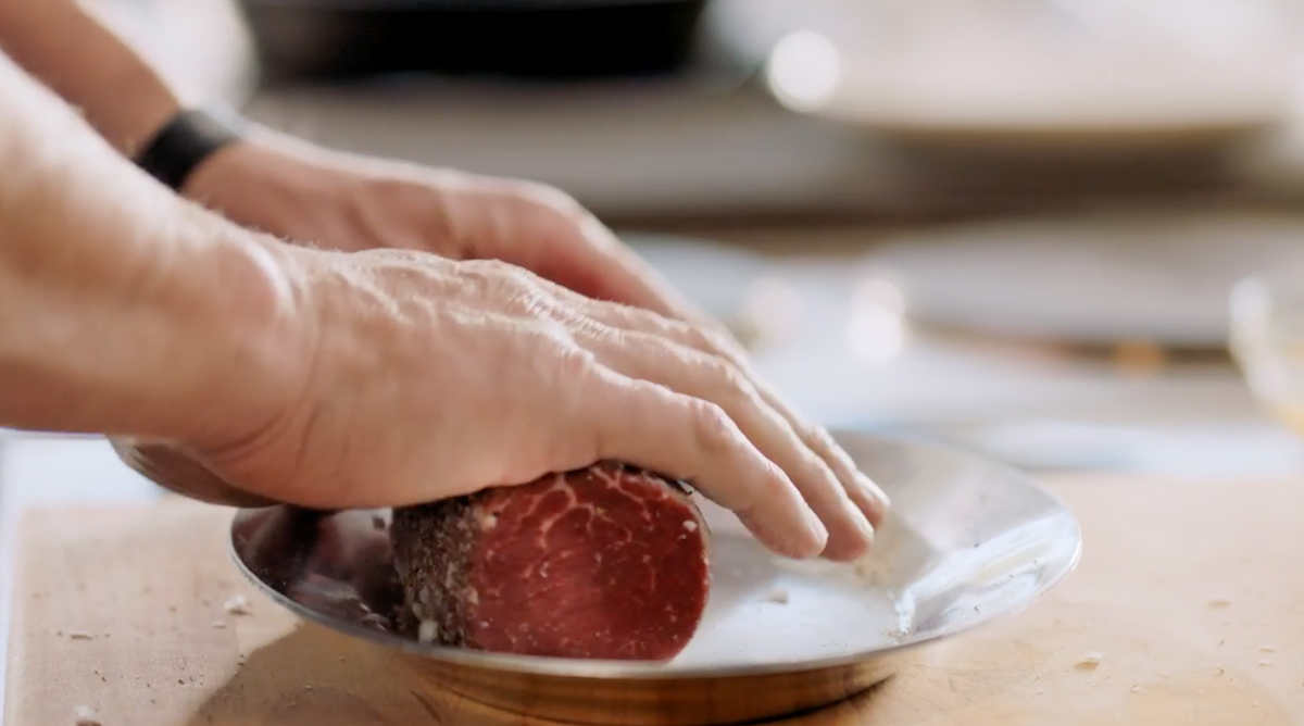 Gordon Ramsay Rolling beef on silver plate