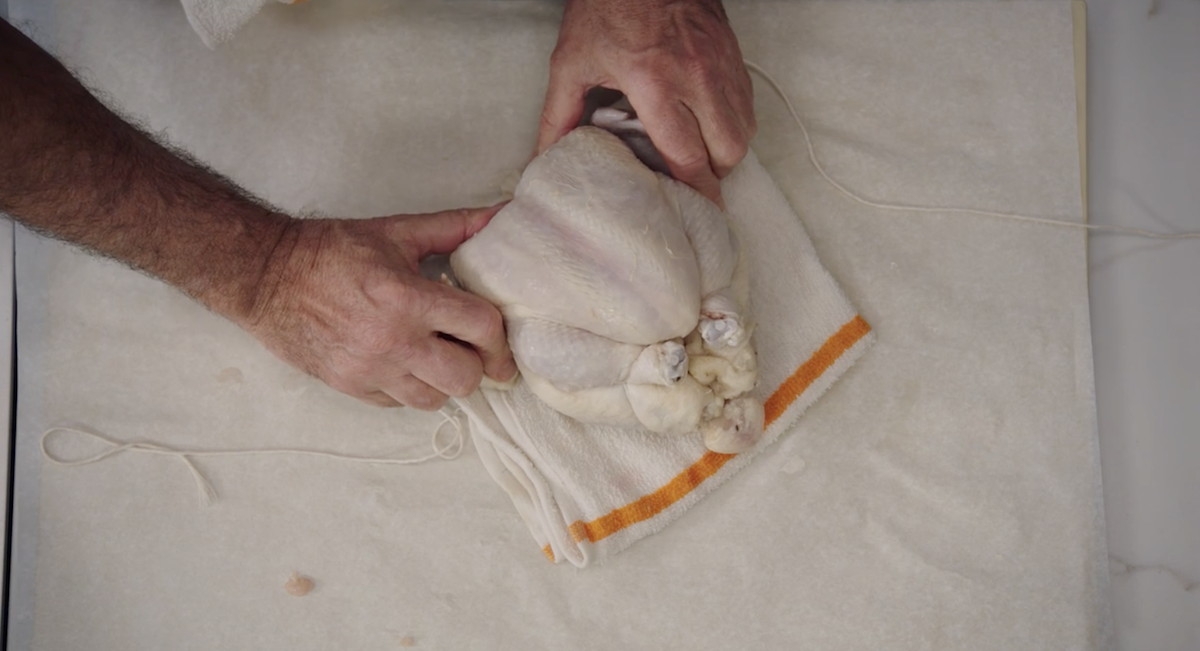 Thomas Keller trussing a chicken 5