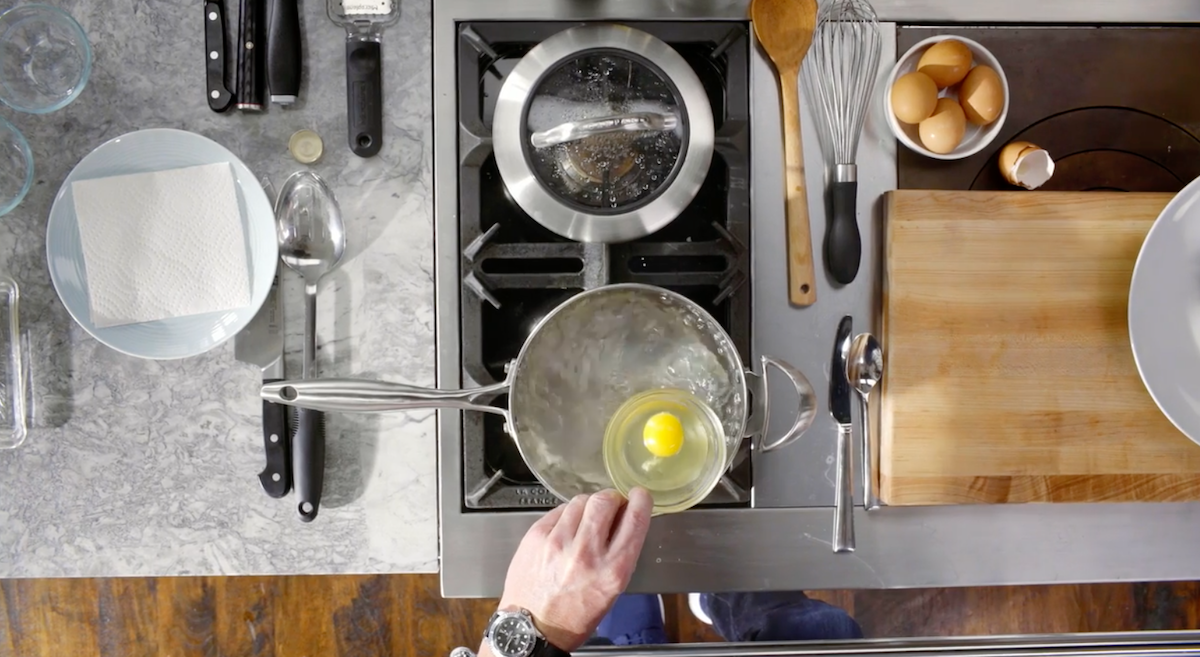 Gordon Ramsay putting egg into boiling water