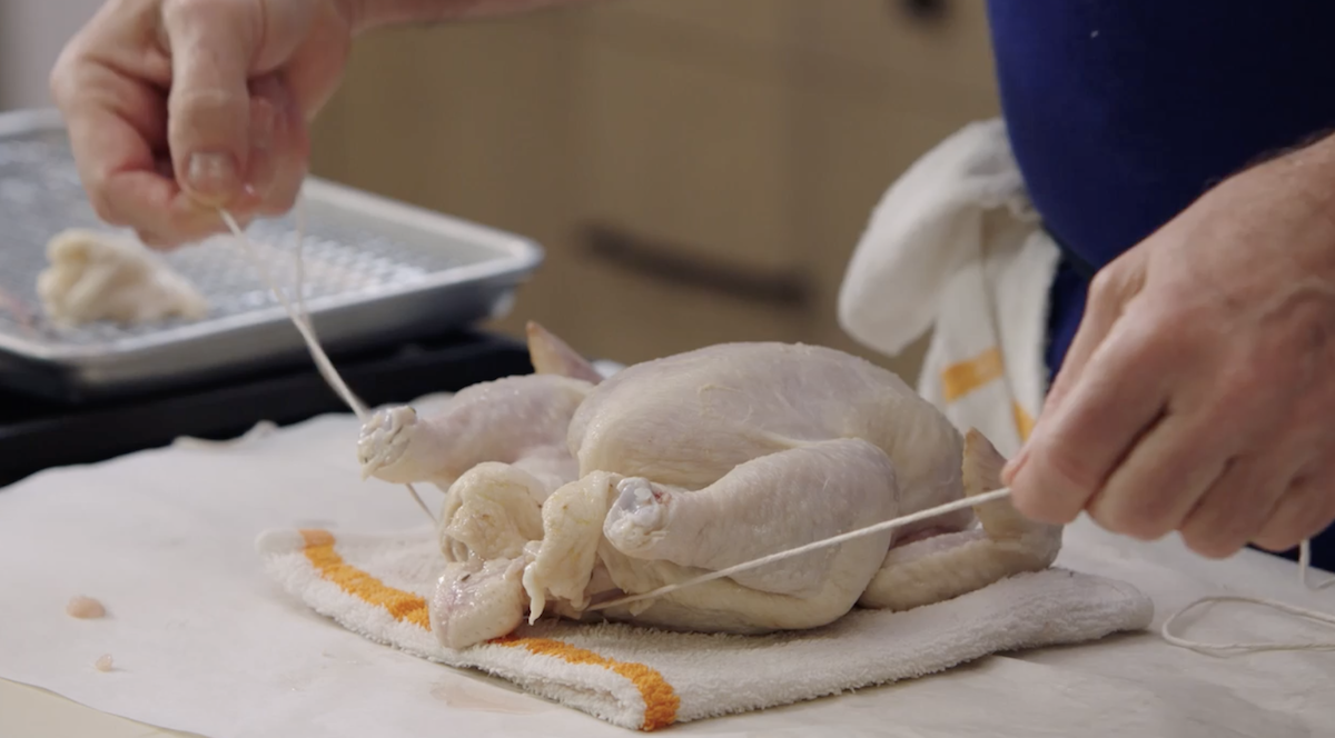 Thomas Keller Trussing a chicken 1