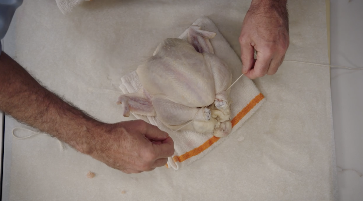 Thomas Keller trussing a chicken 4