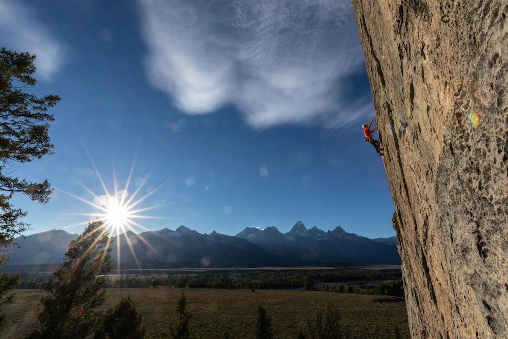 Jimmy Chin's photograph of a climber and example of isolating the subject and rule of thirds