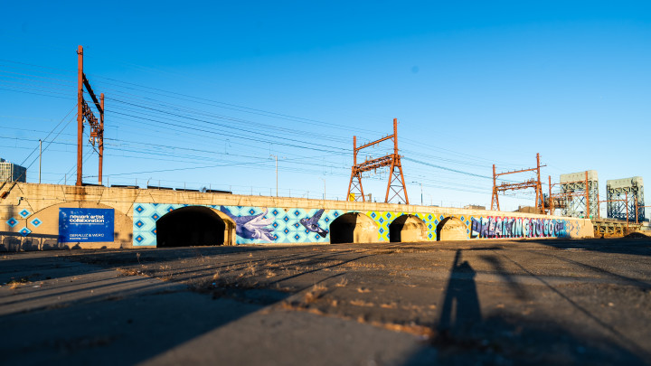 A 500-foot mural beneath a train station and interstate highway