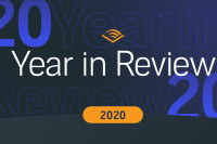 The words Year in Review appear in white against a dark blue background. The year, 2020, appears below it in an orange bubble as well as in faded text in the background of the image. Audible's chevron logo appears in orange at the top of the image.
