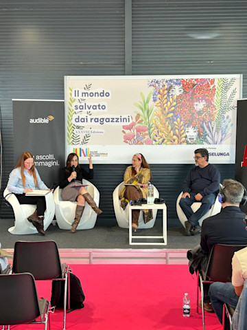(L to R) Audible’s Chief Content Officer Rachel Ghiazza speaks during her panel with journalist Sabina Minardi and Harry Potter: La saga complete narrator Francesco Pannofino.