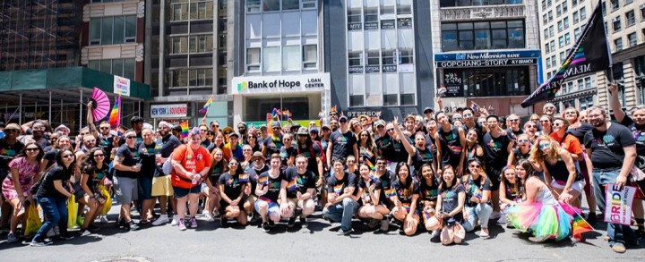 Audible employees and members of Queer Newark Oral History gather together at World Pride March in NYC.