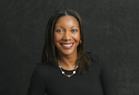 A headshot of Tiffany Jackson, who's wearing a black shirt and necklace. She's smiling. 