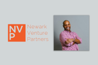 Newark Venture Partner's Managing Partner Vaughn Crowe stands in a purple and white checked shirt  against a grey backdrop. He's leaning back slightly with his arms crossed and is mid-laugh, grinning broadly. The left side of the image has NVP's logo.