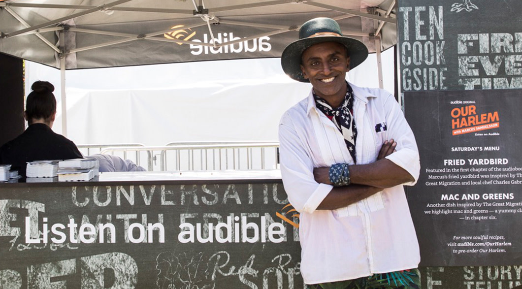 World renowned chef Marcus Samuelsson stands in front of the "Our Harlem" foodtruck.