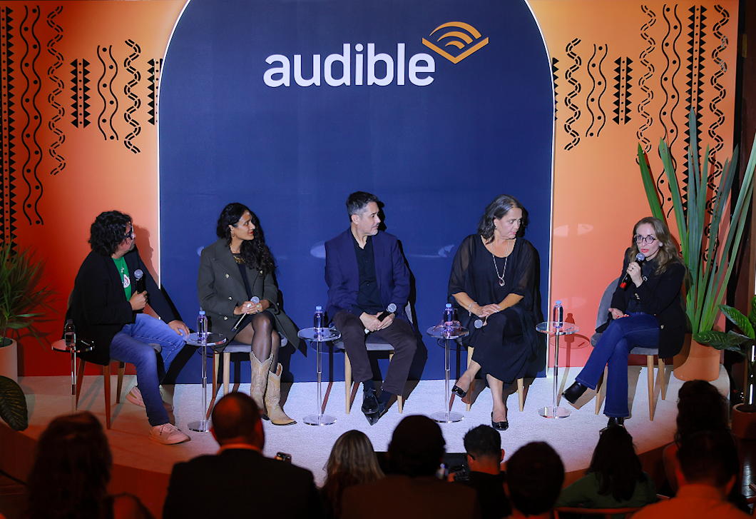 A photograph of a panel discussion from Audible's celebration that took place in Mexico. 