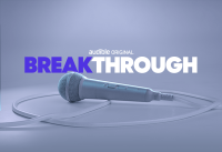 A microphone lays flat with the title "Breakthrough" above it.