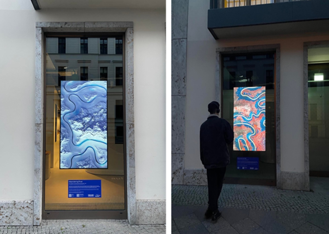 a window with a multimedia installation on it