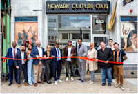Local leaders, business owners, and Audible representatives at the ribbon-cutting for Newark Culture Club.
