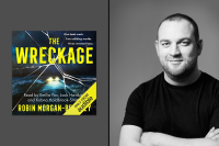Audible employee and Author Robin Morgan-Bentley is featured prominently in Black & White with his hands crossed alongside the cover artwork of his debut novel, "The Wreckage".