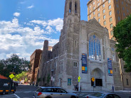 Audible's Innovation Cathedral sits front and center with other Newark buildings in the background.