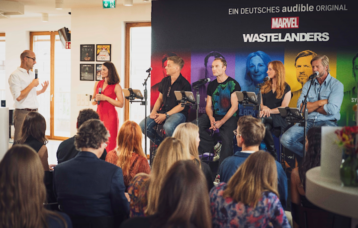 Oliver Daniel, Audible’s country manager for Germany, with the cast of Marvel’s Wastelanders at an event in Berlin this year.