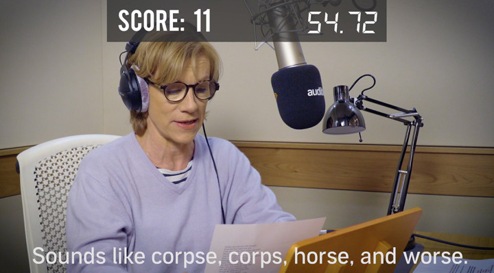 Juliet Stevenson at the mic testing her oral dexterity in Audible UK's Tongue Twister Challenge.
