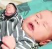 newborn sneezing