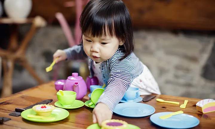 Toddler playing indoors