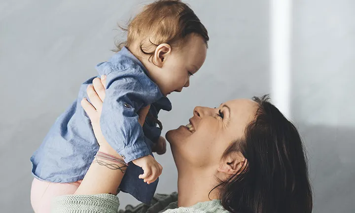 Woman holding a baby