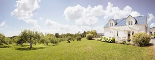 Hier sehen Sie ein Haus als Sinnbild für die Themen Immobilienthemen und Immobilienwissen.