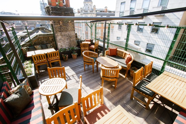A sunny pub roof terrace in the Bow Street Tavern pub in Covent Garden.