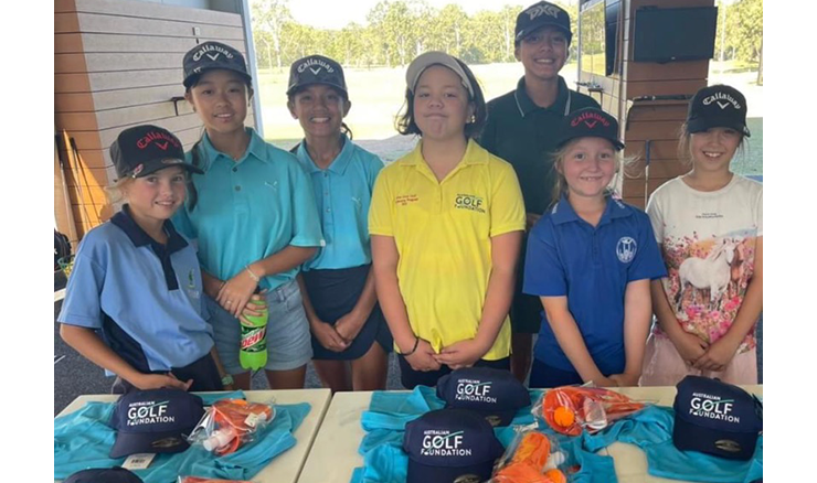 Girls receiving their uniforms at Meadowbrook's induction session earlier in the year.