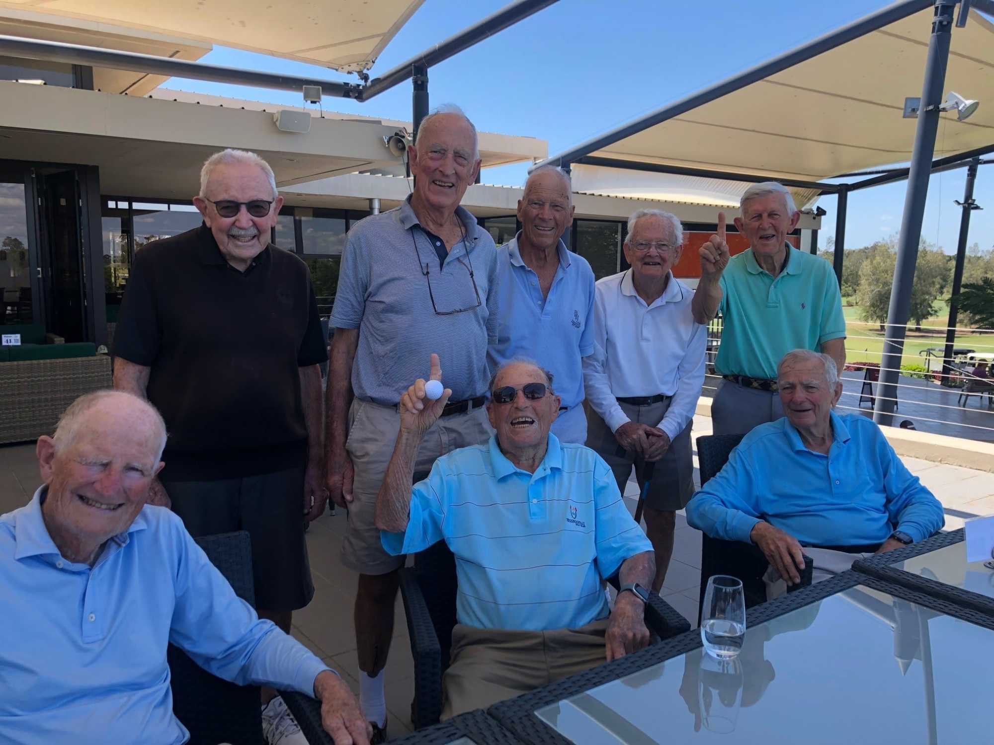 Indooroopilly's self-proclaimed 'Old and Bold' group of members celebrating Hugh Brown's hole-in-one.