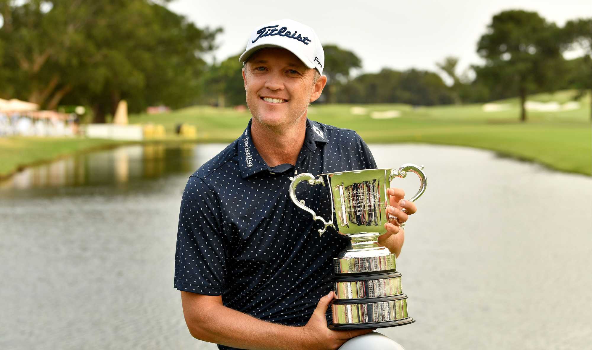 Matt Jones hoists the Stonehaven Cup for a second time at his home club, The Australian, in 2019.